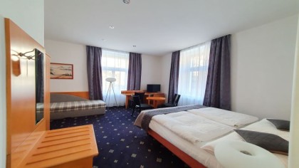 Třílůžkový pokoj